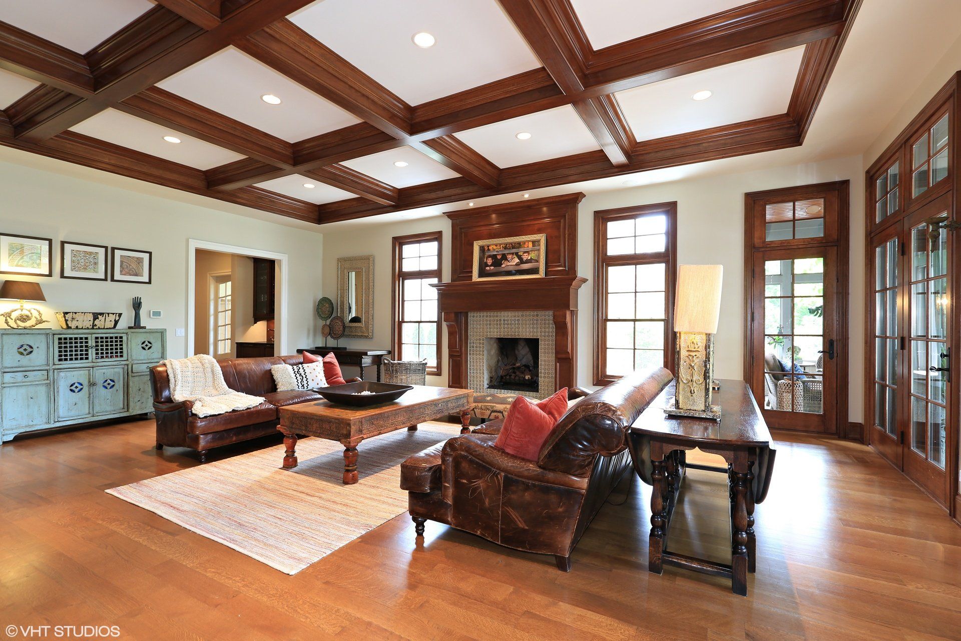 A living room filled with furniture and a fireplace.