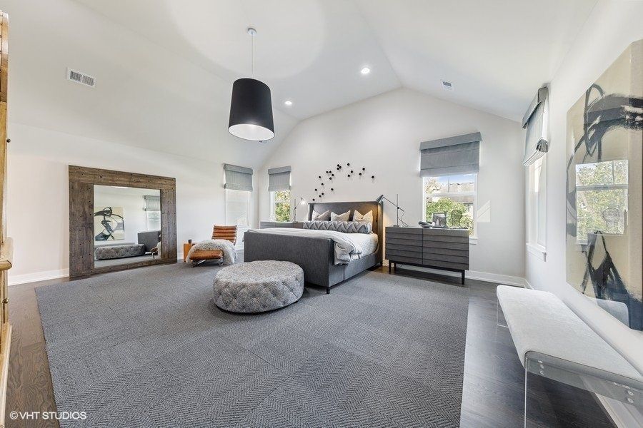 There is a large bed in the middle of the room.