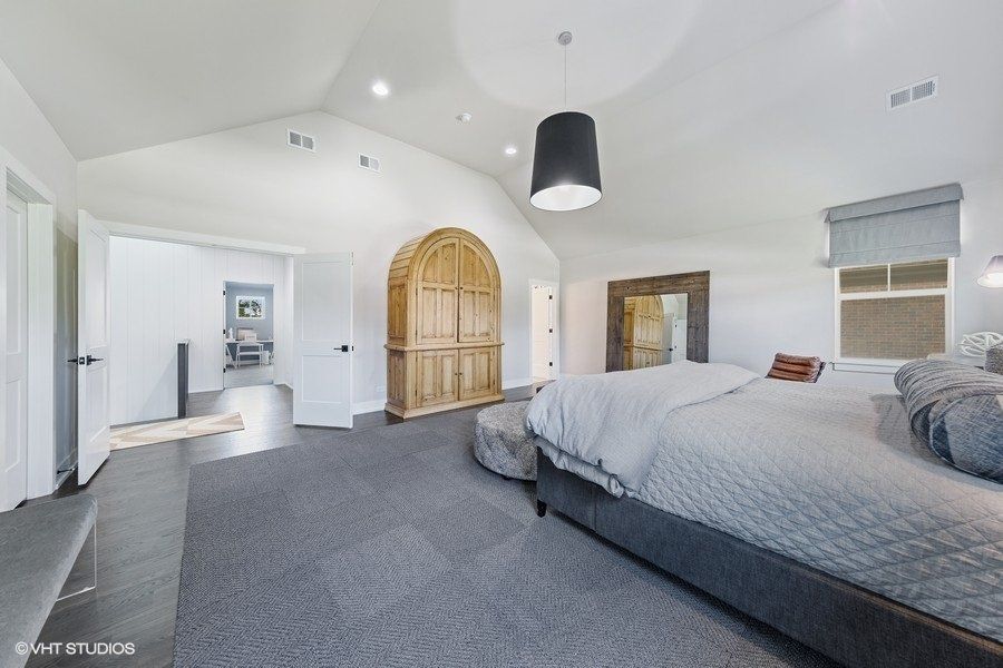 There is a large bed in the middle of the room.