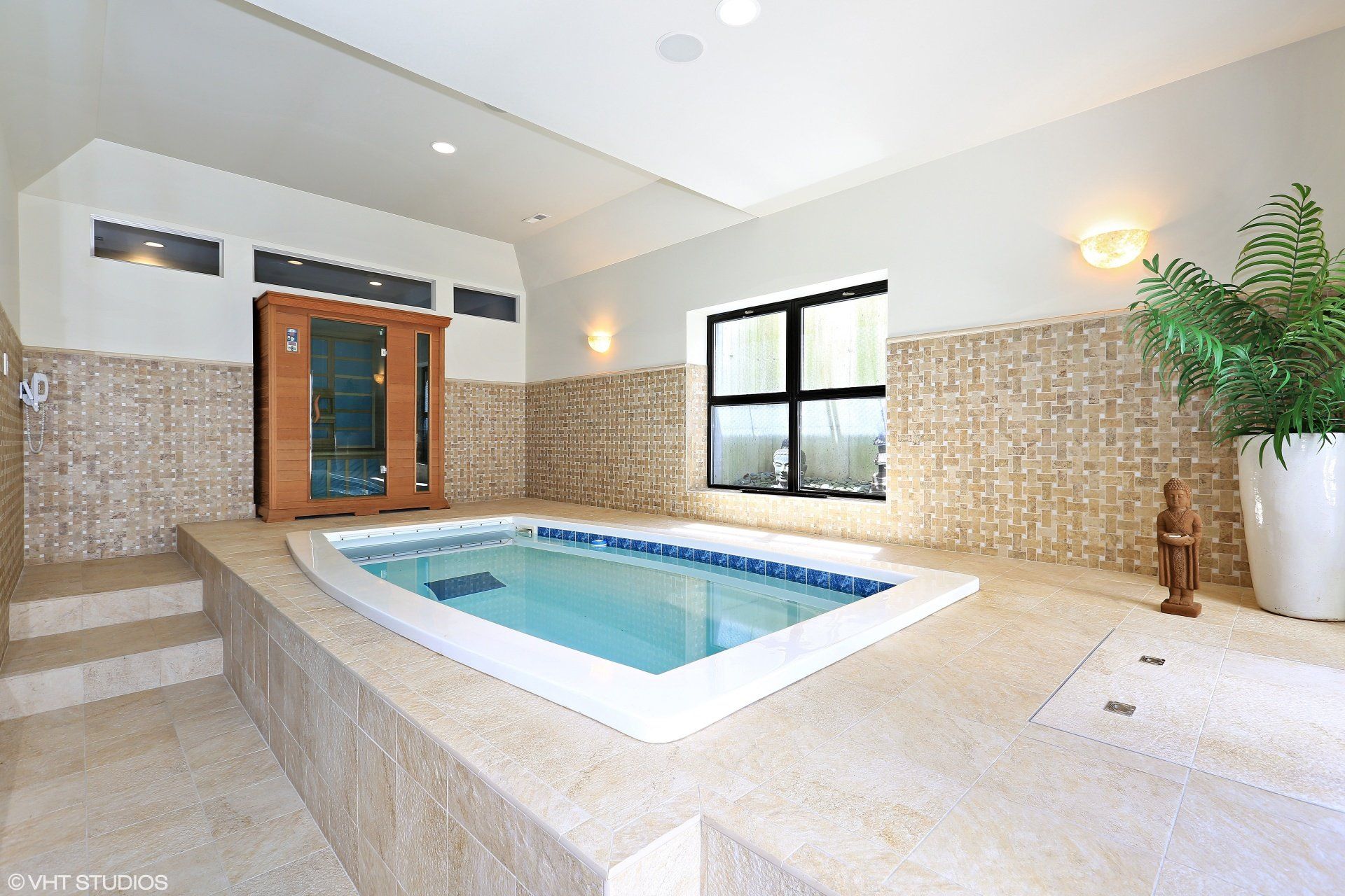 There is a swimming pool in the middle of the room.