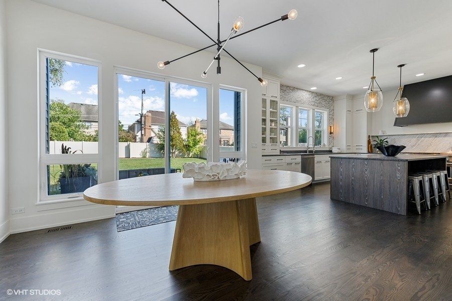 There is a large table in the middle of the room.