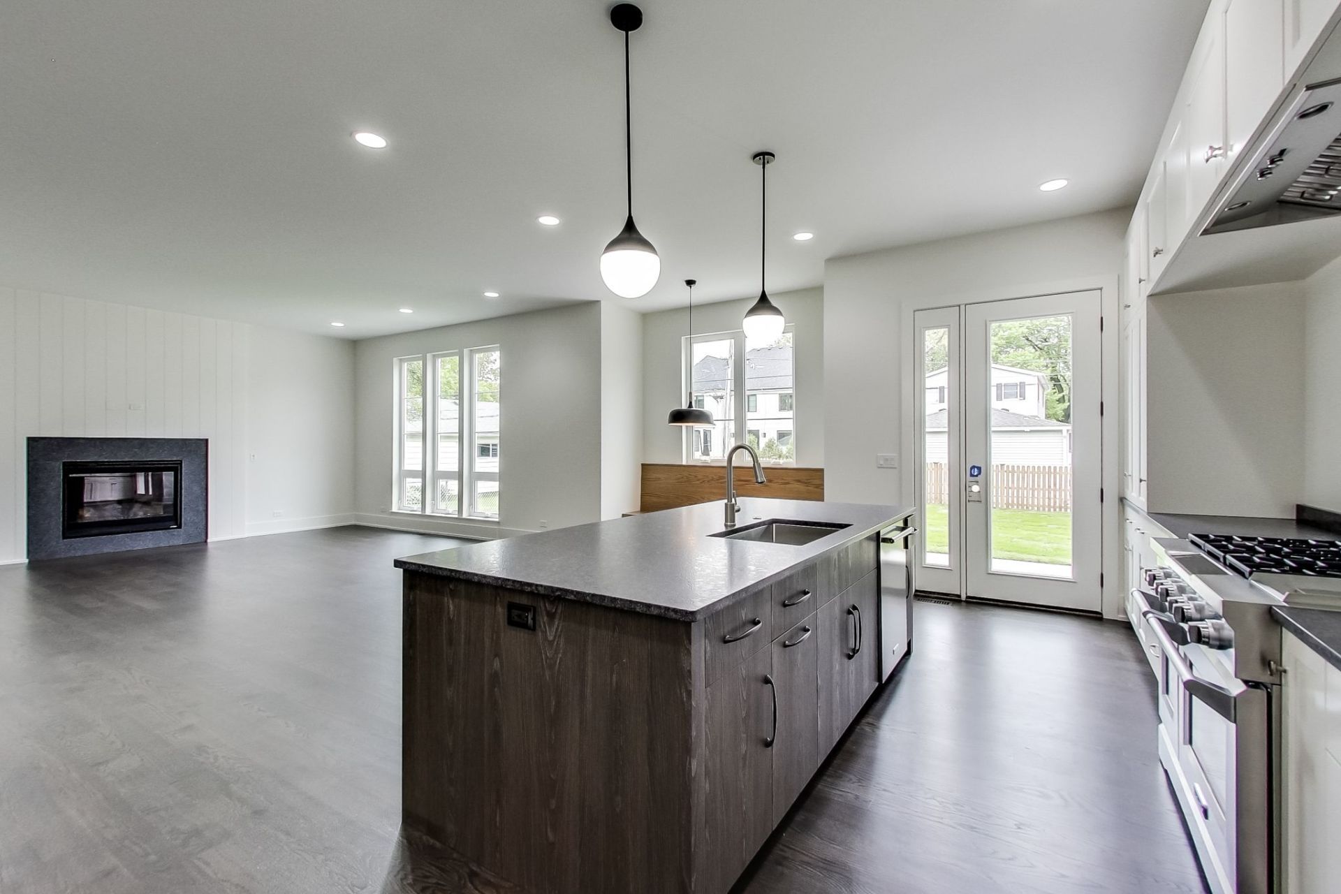 There is a large island in the middle of the kitchen.