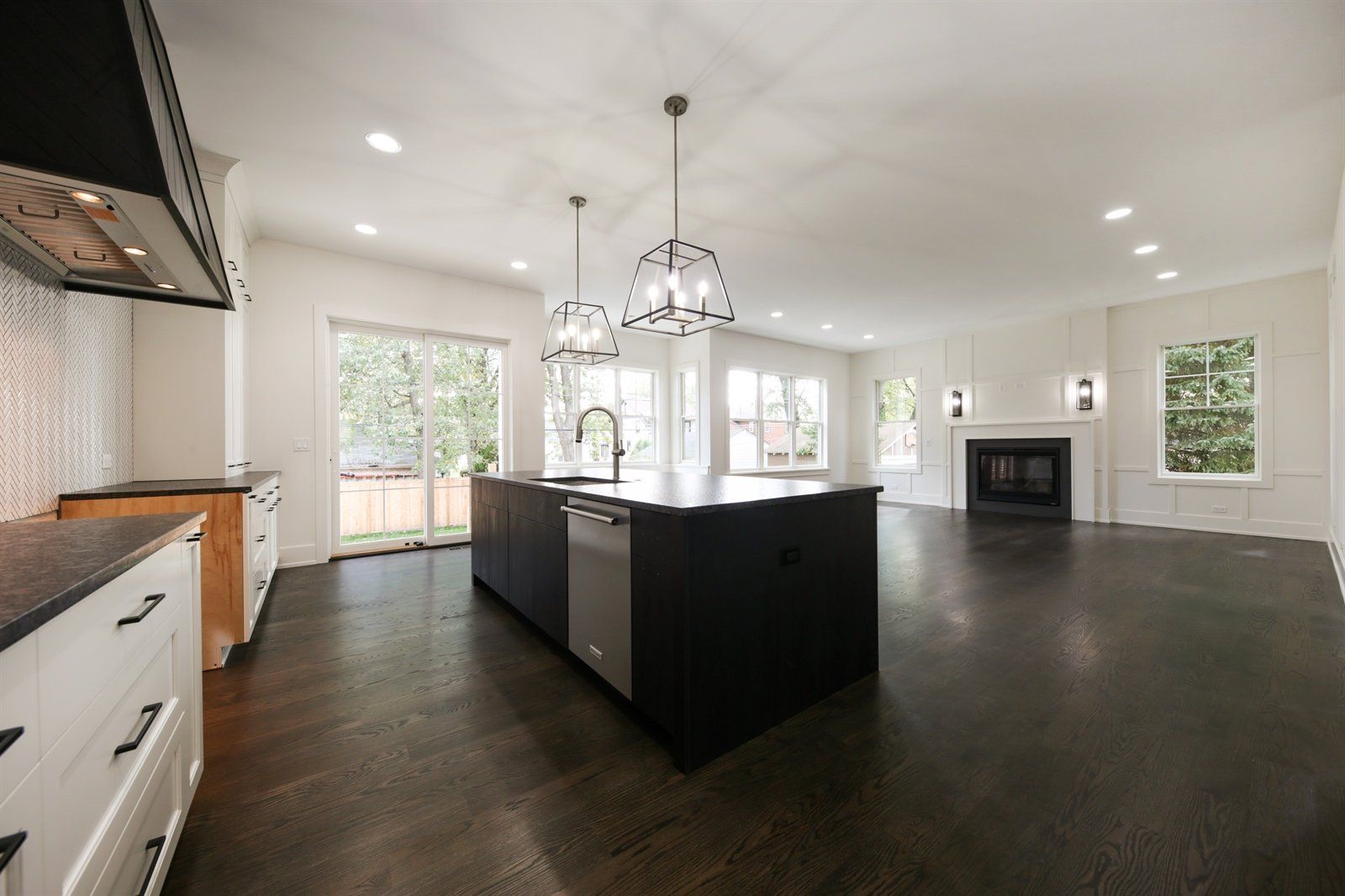 There is a large island in the middle of the kitchen.