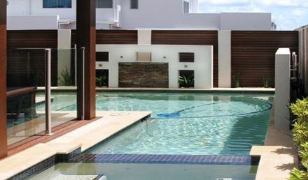 Modern swimming pool and glass fencing