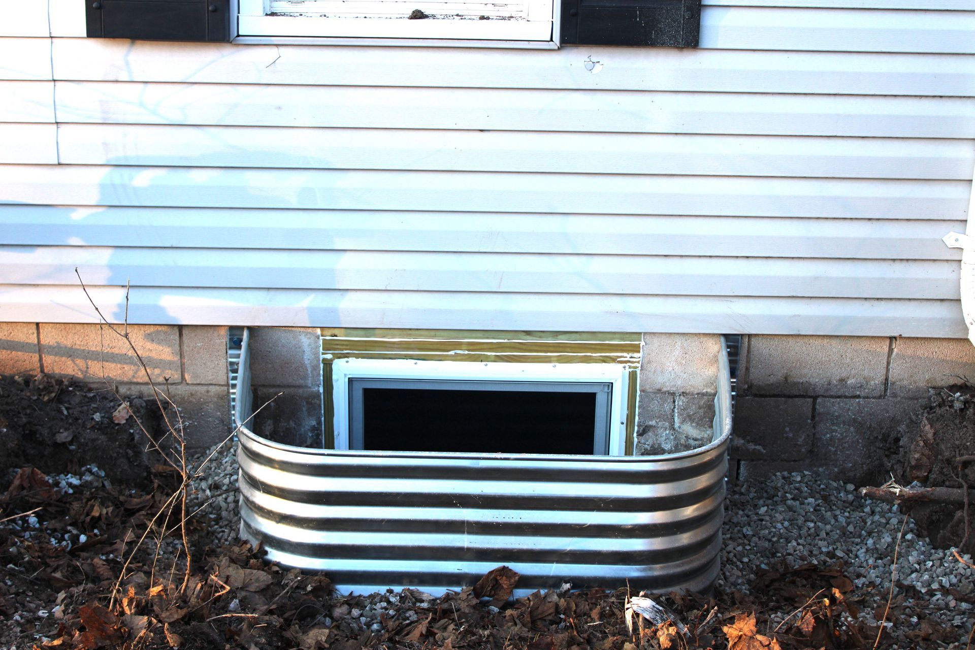 Exterior view of a window well. 