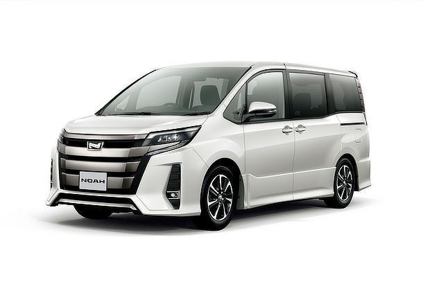 White Toyota Noah minivan.