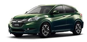 Green Honda HR-V compact SUV on white background.