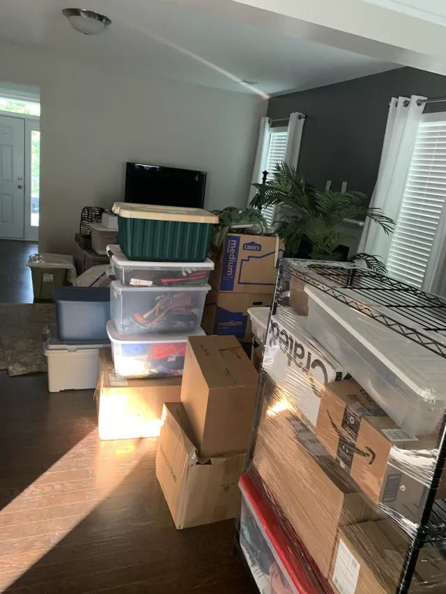 A Living Room Filled with Boxes