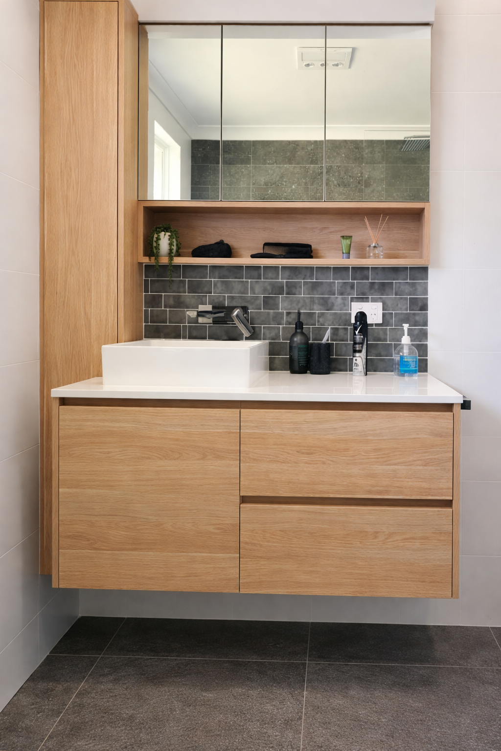 Wooden Bathroom Vanity with A Rectangular Sink, Mirror, and Tiled Backsplash — Paul Tagget Kitchens In Goonellabah, NSW