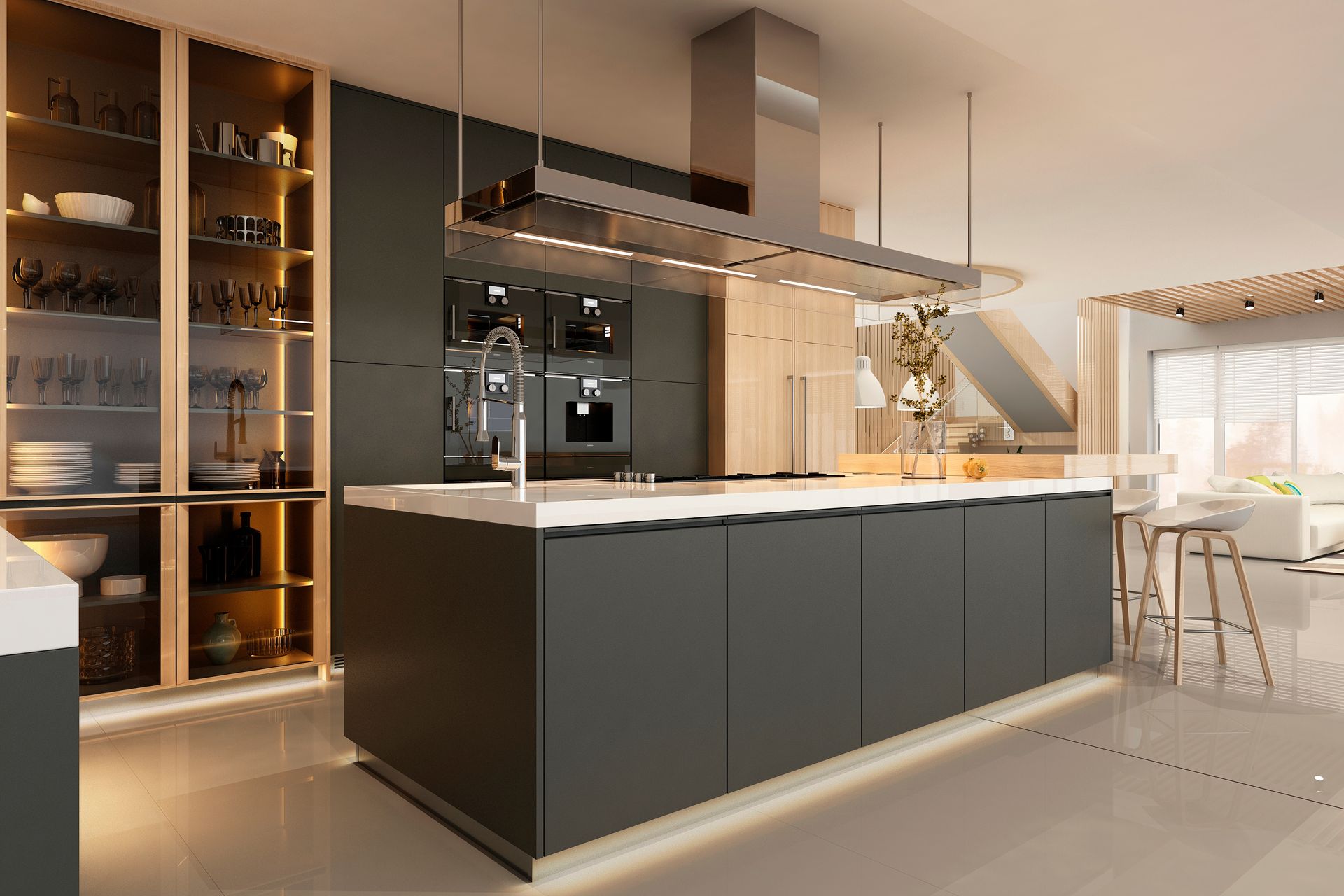 Modern kitchen with dark gray cabinets, island, and stainless steel range hood.