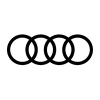 Il logo Audi è un cerchio bianco e nero su sfondo bianco.