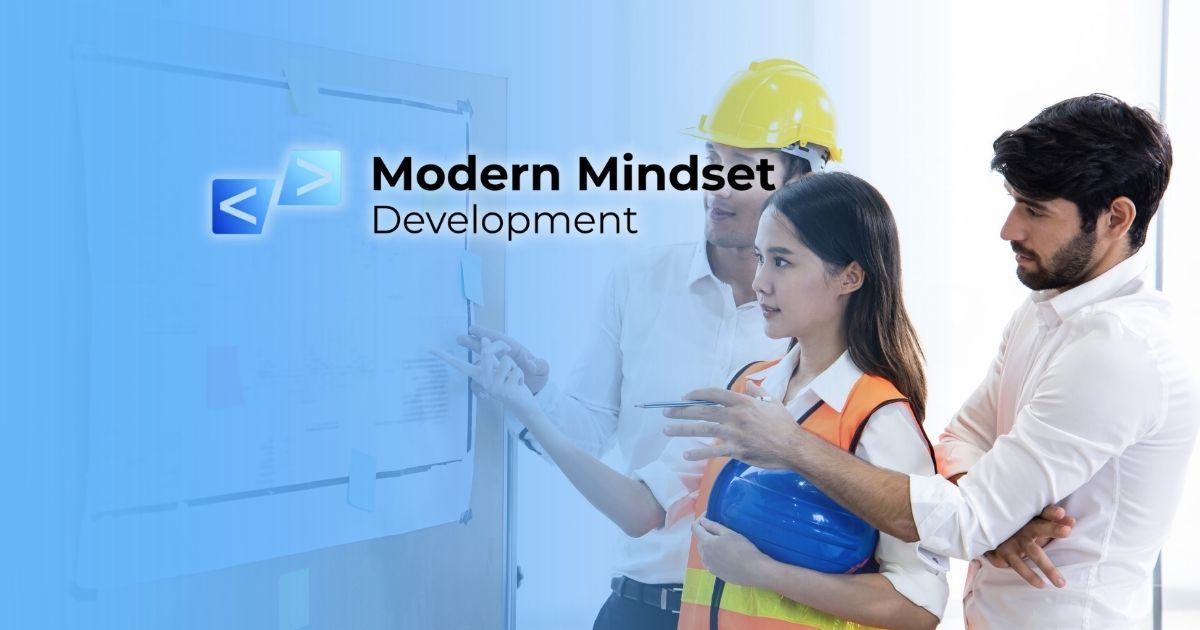 Modern Mindset presentation with three people in safety gear at a whiteboard