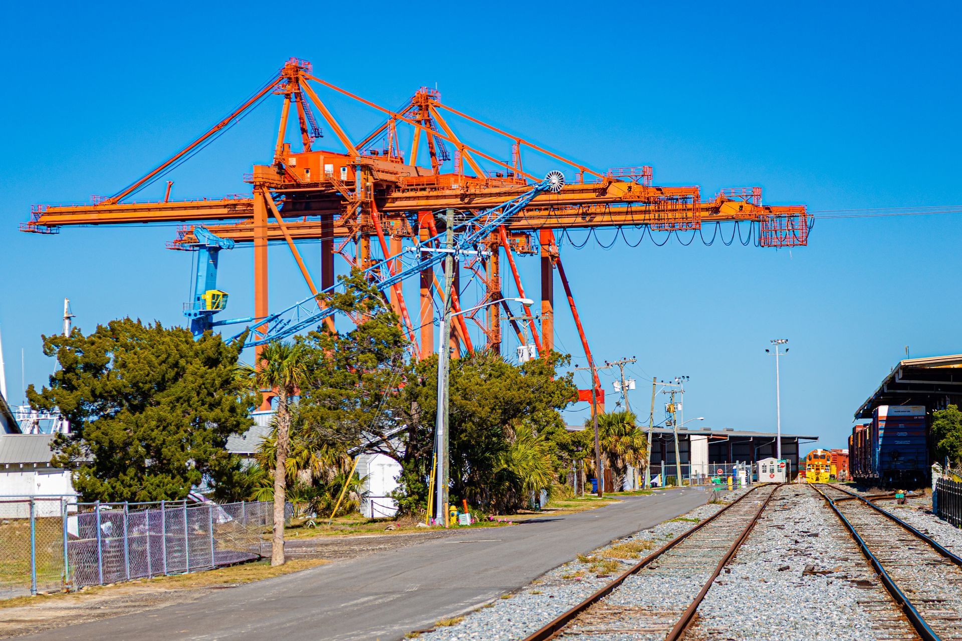 Picture of the railway on Amelia Island and the Port cranes in the background