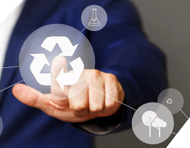 A hand in a business suit touches a digital screen featuring a recycling icon and environmental symbols.