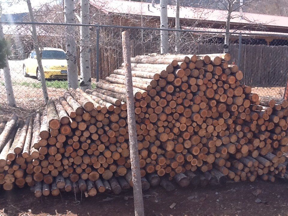 Pile of coyote fence posts - Coyote Fencing in Santa Fe NM
