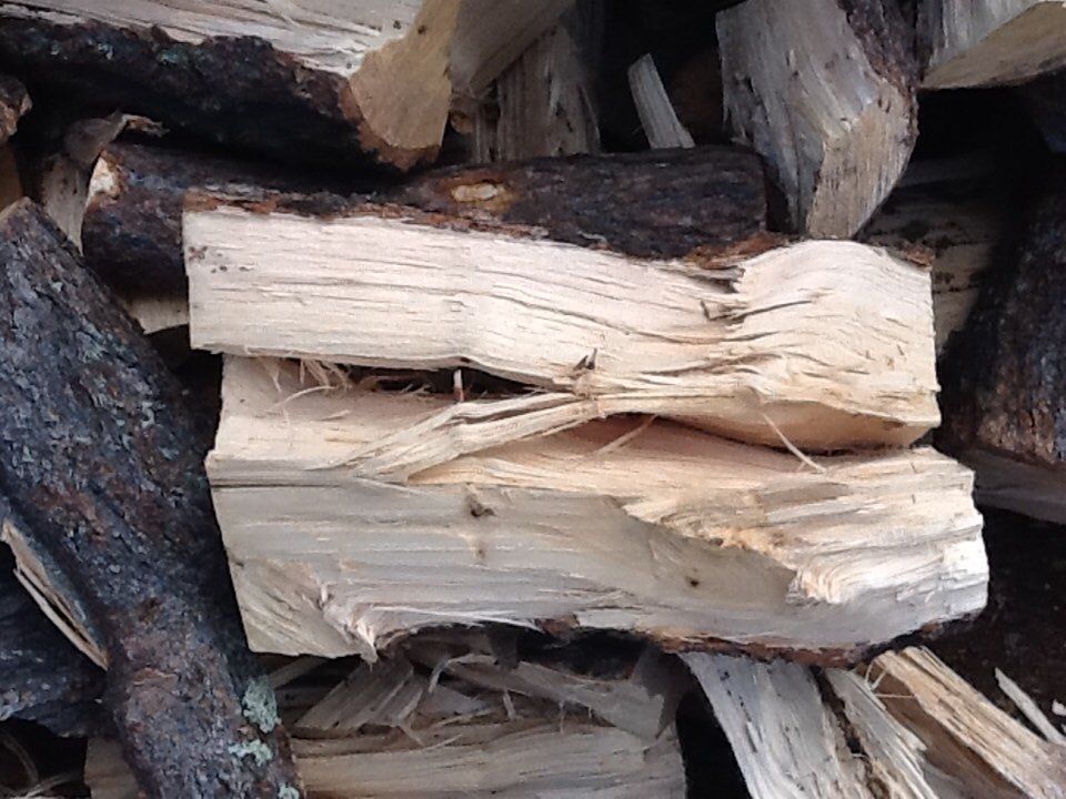 Splitting firewood - Firewood in Santa Fe NM