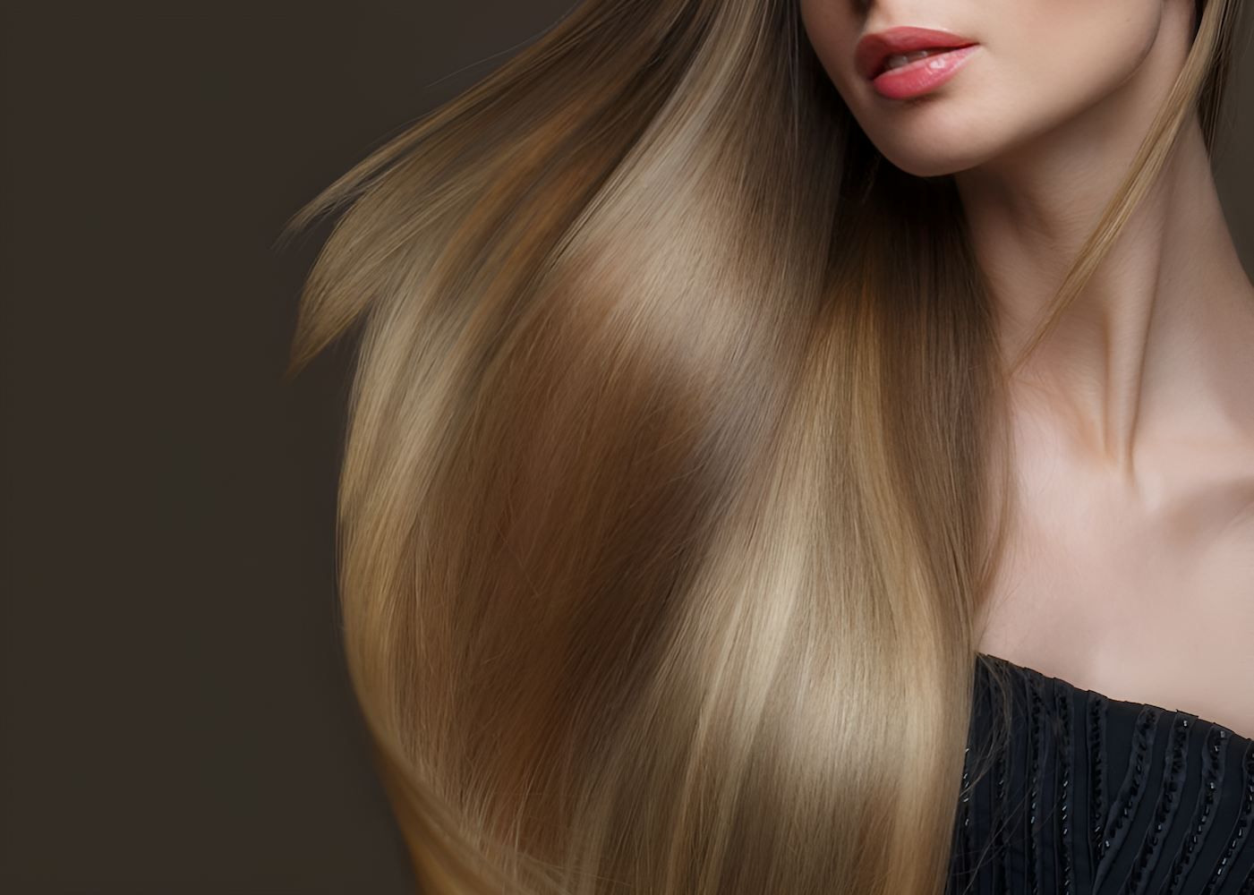A Woman With Long Blonde Hair is Wearing a Black Top — Elements Hair Artists In Belmont, NSW