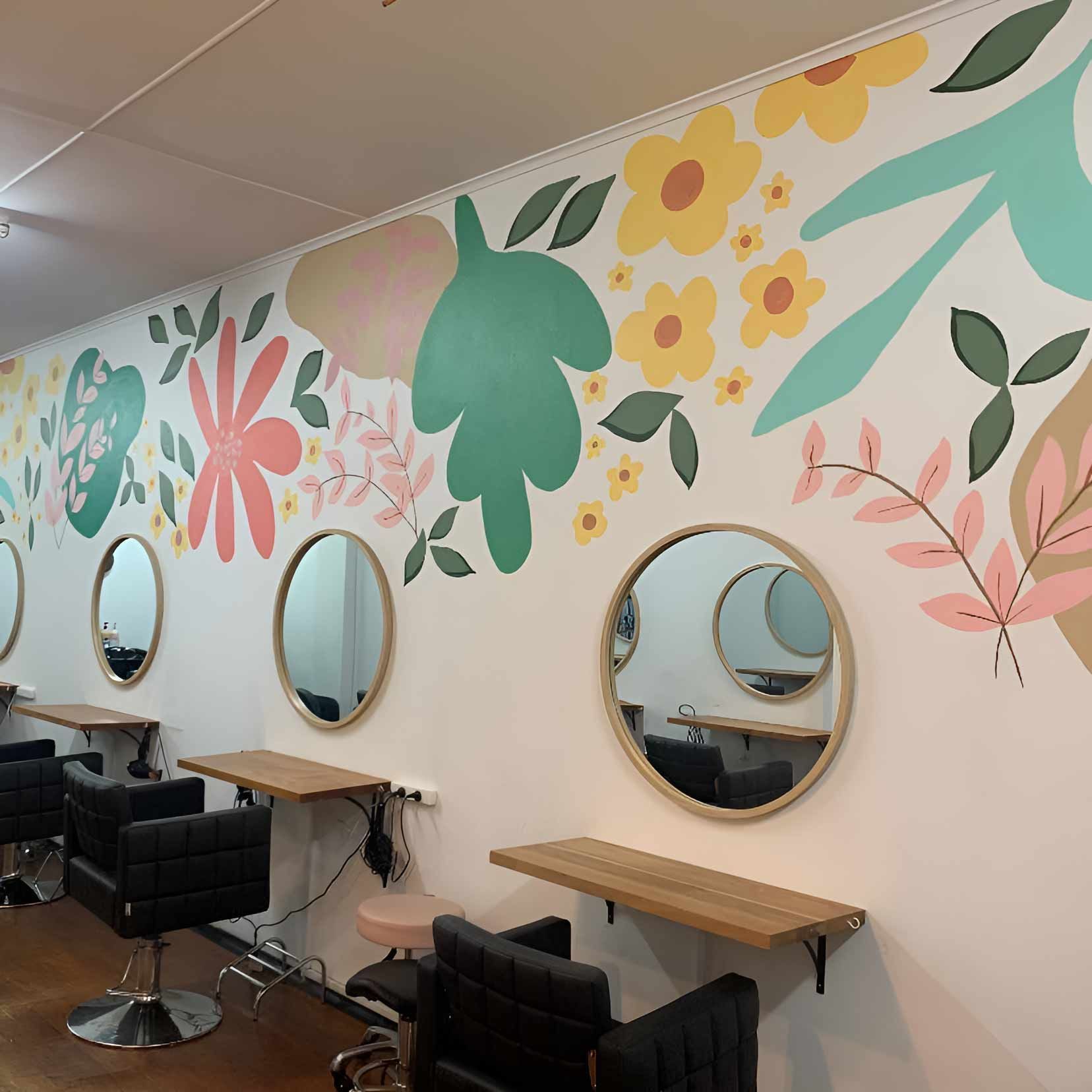 A Hair Salon With A Mural Of Flowers On The Wall — Elements Hair Artists In Belmont, NSW