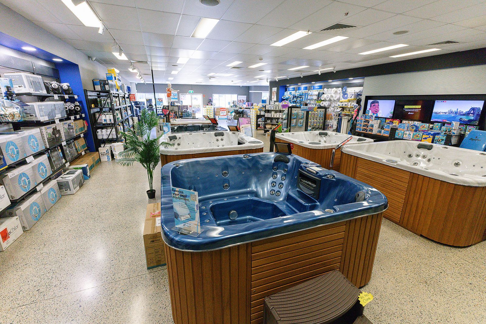 A Sapphire Black Pool Spa Is Displayed In A Store — Pool Zone in Port Macquarie, NSW