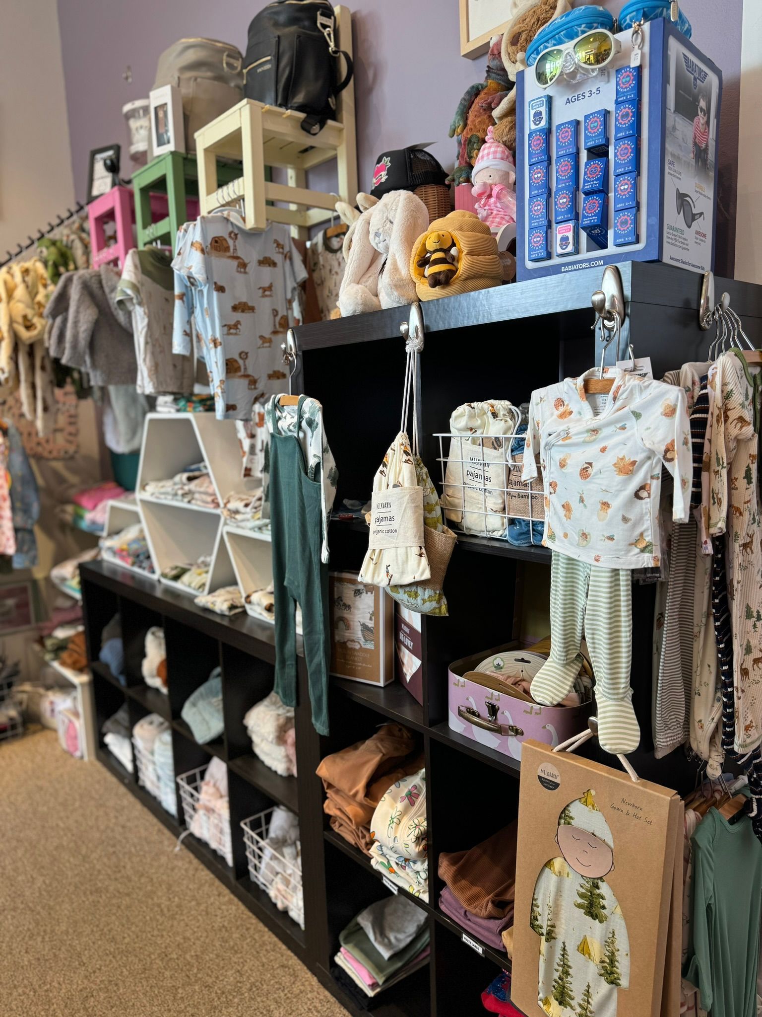 A store filled with lots of baby clothes and toys.