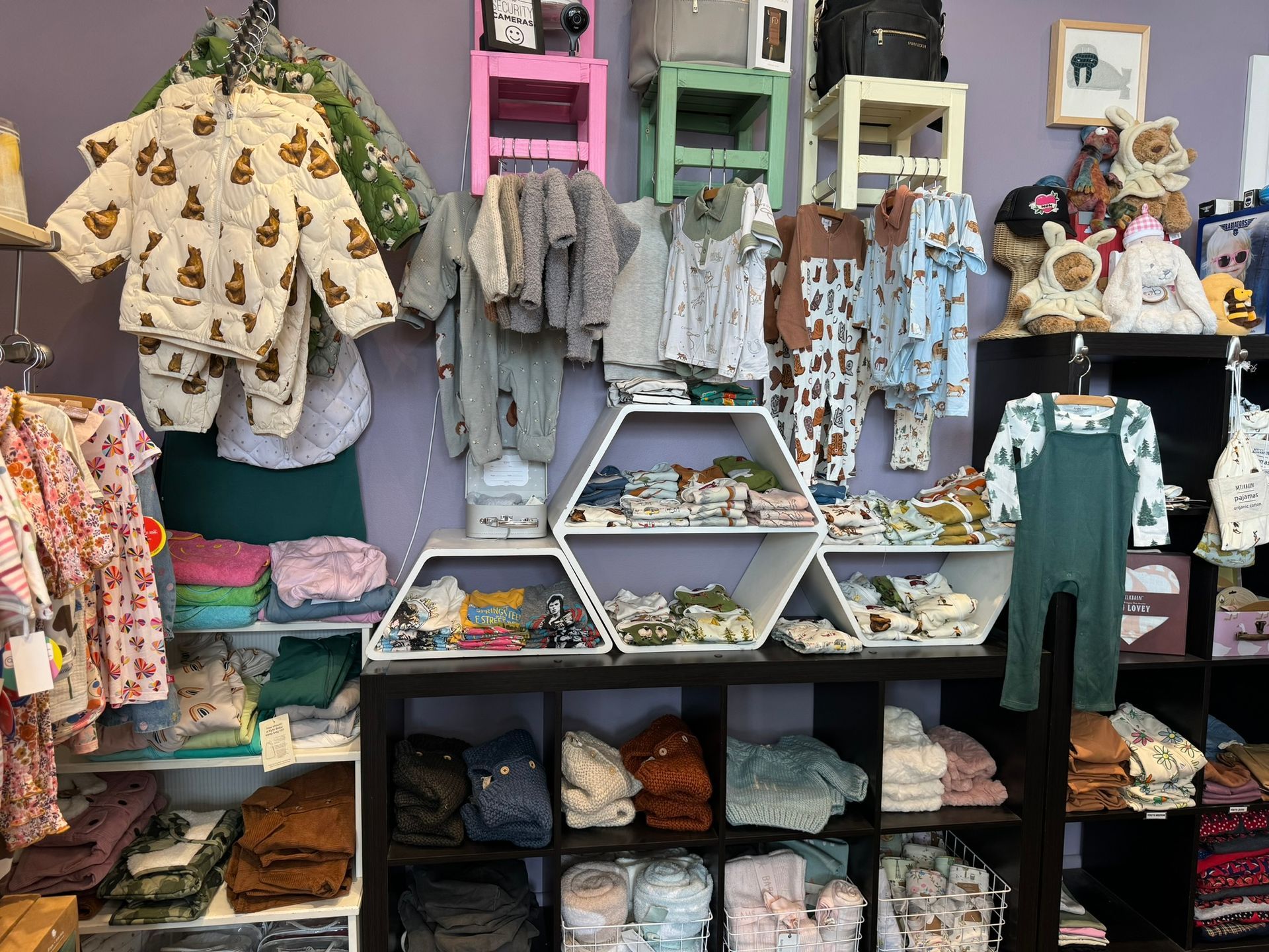 A store filled with lots of baby clothes and toys.