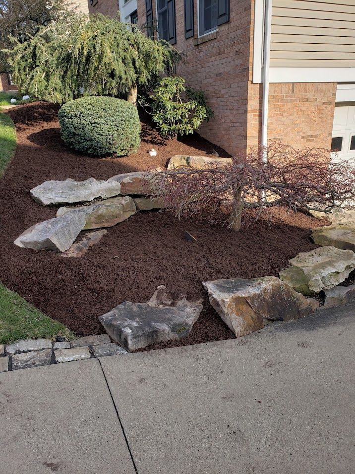 Brick House with A Rock Garden — Bridgeville, PA — MC Landscaping