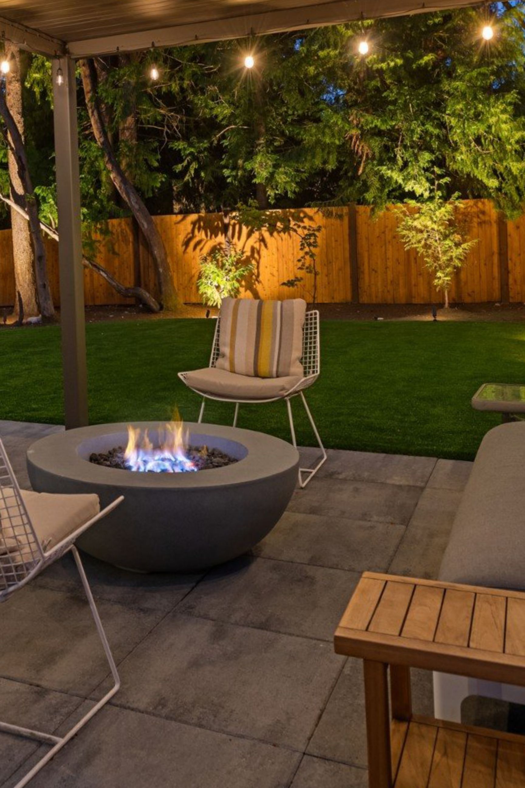 Fire pit done in an outdoor landscape design by We Do Construction