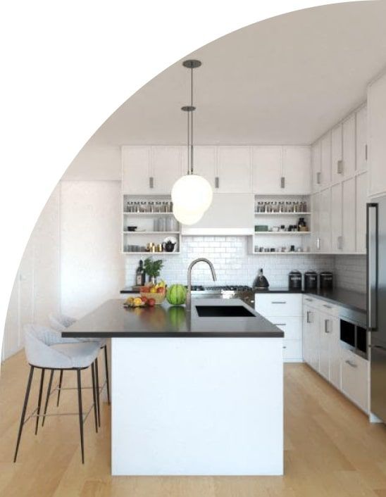 Modern white kitchen with island, black countertop, and pendant light.