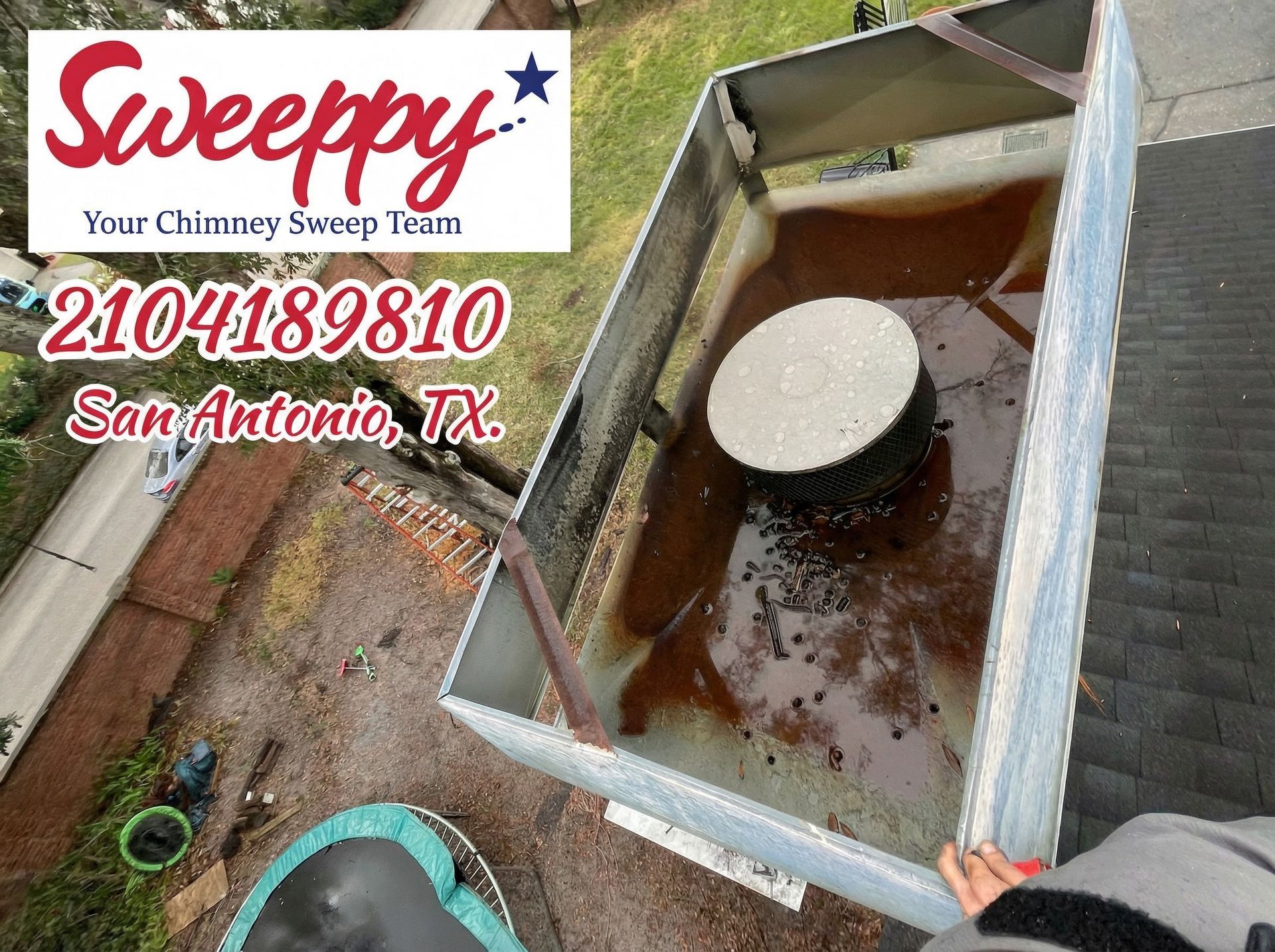 Woman sitting by a fireplace, using a phone. Cozy room with firelight.