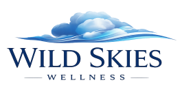 Wild Skies Wellness logo with blue cloud and wave design