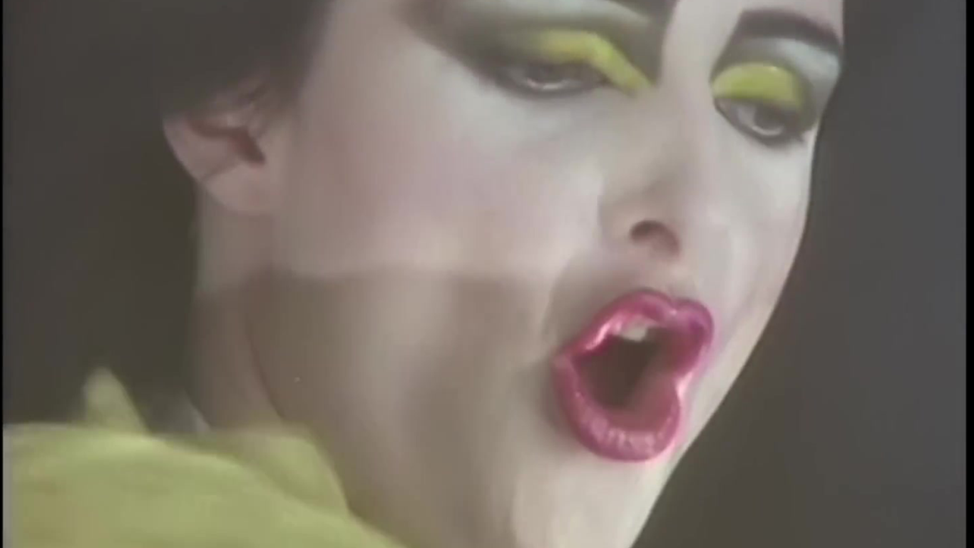 Siouxsie Sioux's iconic and influential style, along with her powerful vocals, made her a pivotal figure in the goth subculture. A close-up of Siouxsie Sioux of the goth band Siouxsie and the Banshees with her signature dramatic eye makeup.