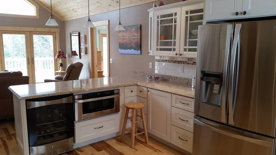 gorgeous white kitchen cabinets and stainless steel appliances