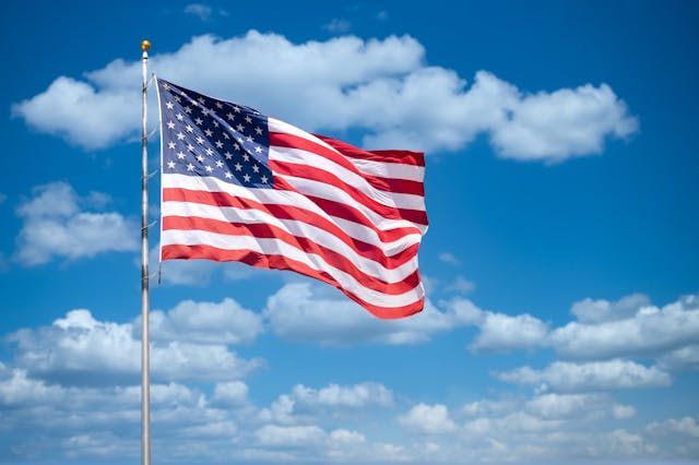An American flag blowing in the wind