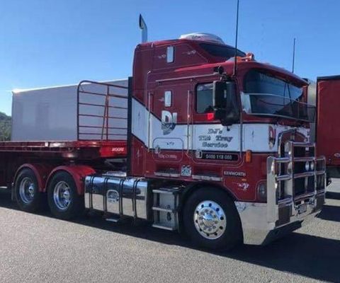 A Large Red Truck — DJ’s Tilt Tray Service in Urunga NSW
