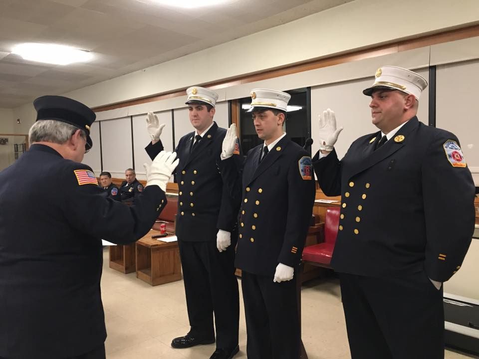 volunteer firefighters taking the oath