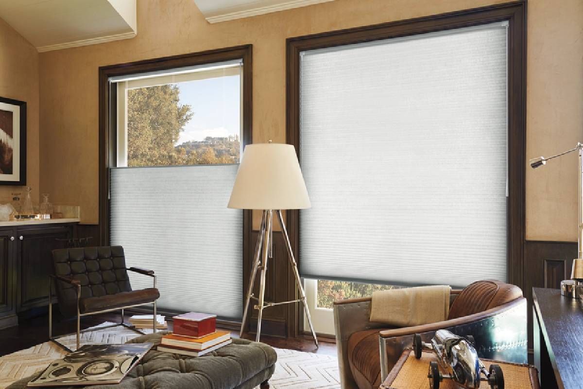 Home office with window decorated with Cellular Shades at Alton Bay Blinds near Hampton, NH
