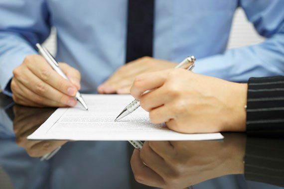 Signing Contract — Legal Services in Melrose, MA Signing Contract — Legal Services in Melrose, MA