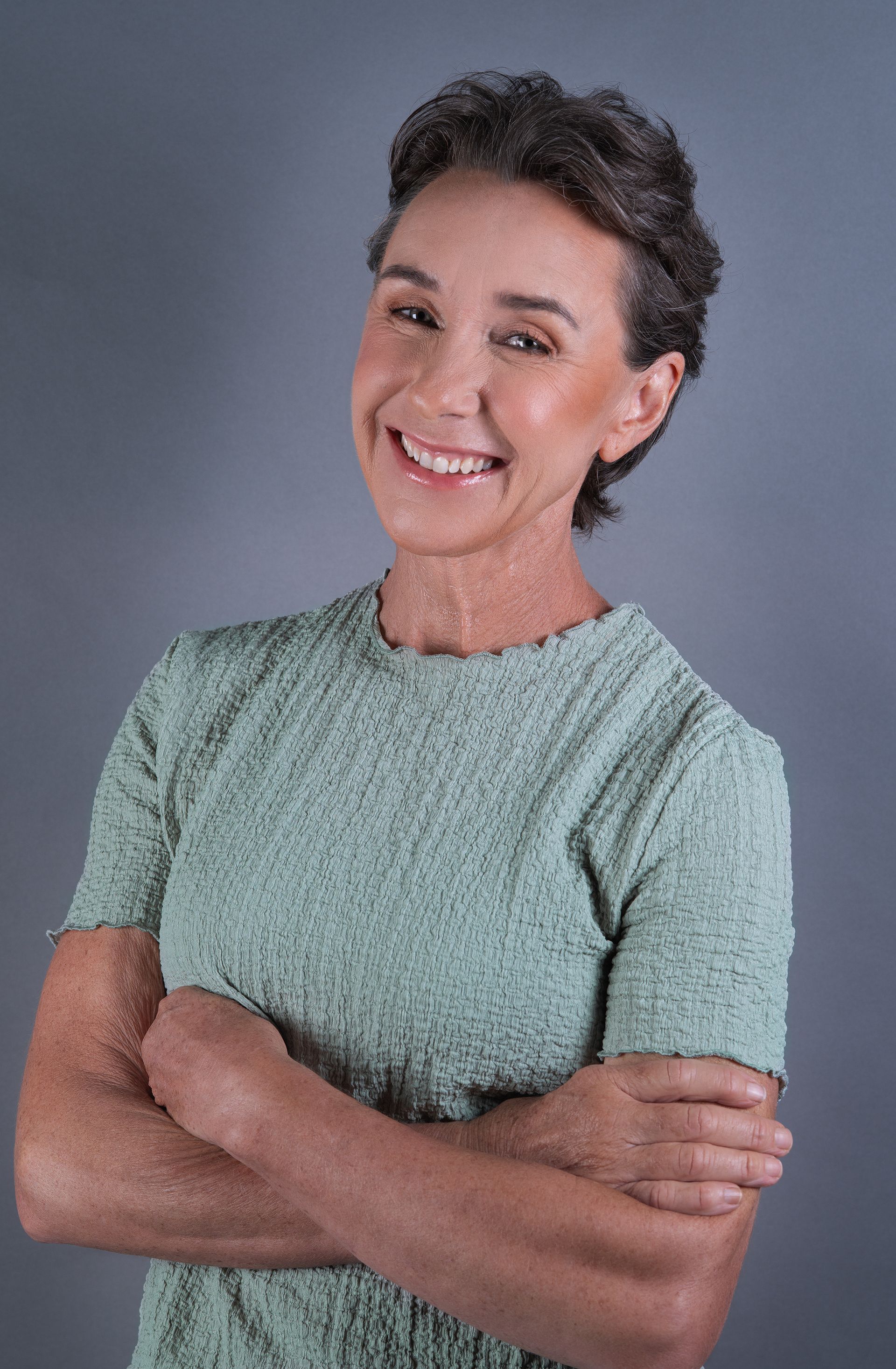 A Dentist is Holding a Model of Teeth in His Hands — Dental Prosthetics By Richard & Cindy In Oxenford, QLD