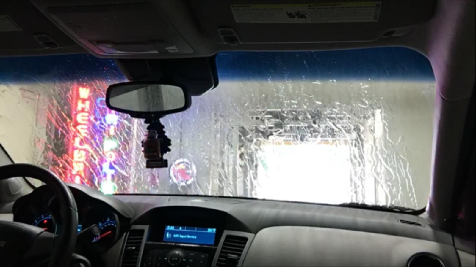 A car is going through a car wash.