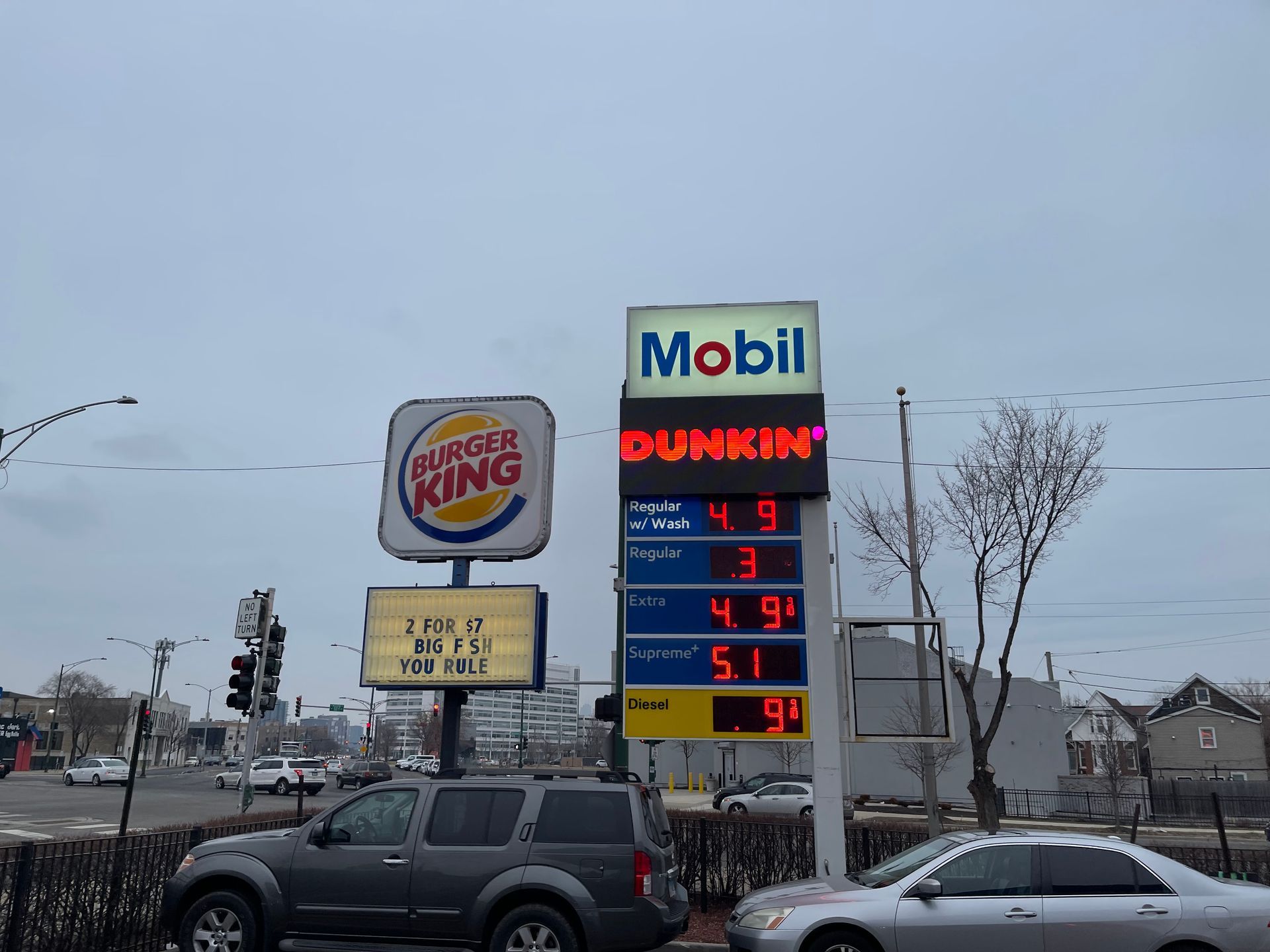 A burger king and dunkin ' donuts gas station