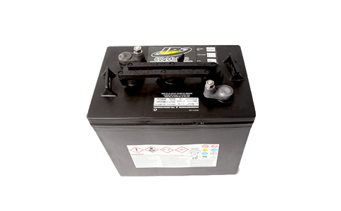 A black battery is sitting on top of a white surface.