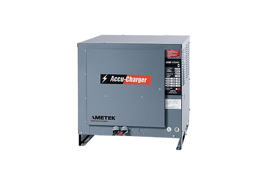 A battery charger is sitting on a white surface.