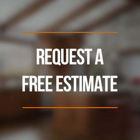 A sign that says `` request a free estimate '' with a blurry background.