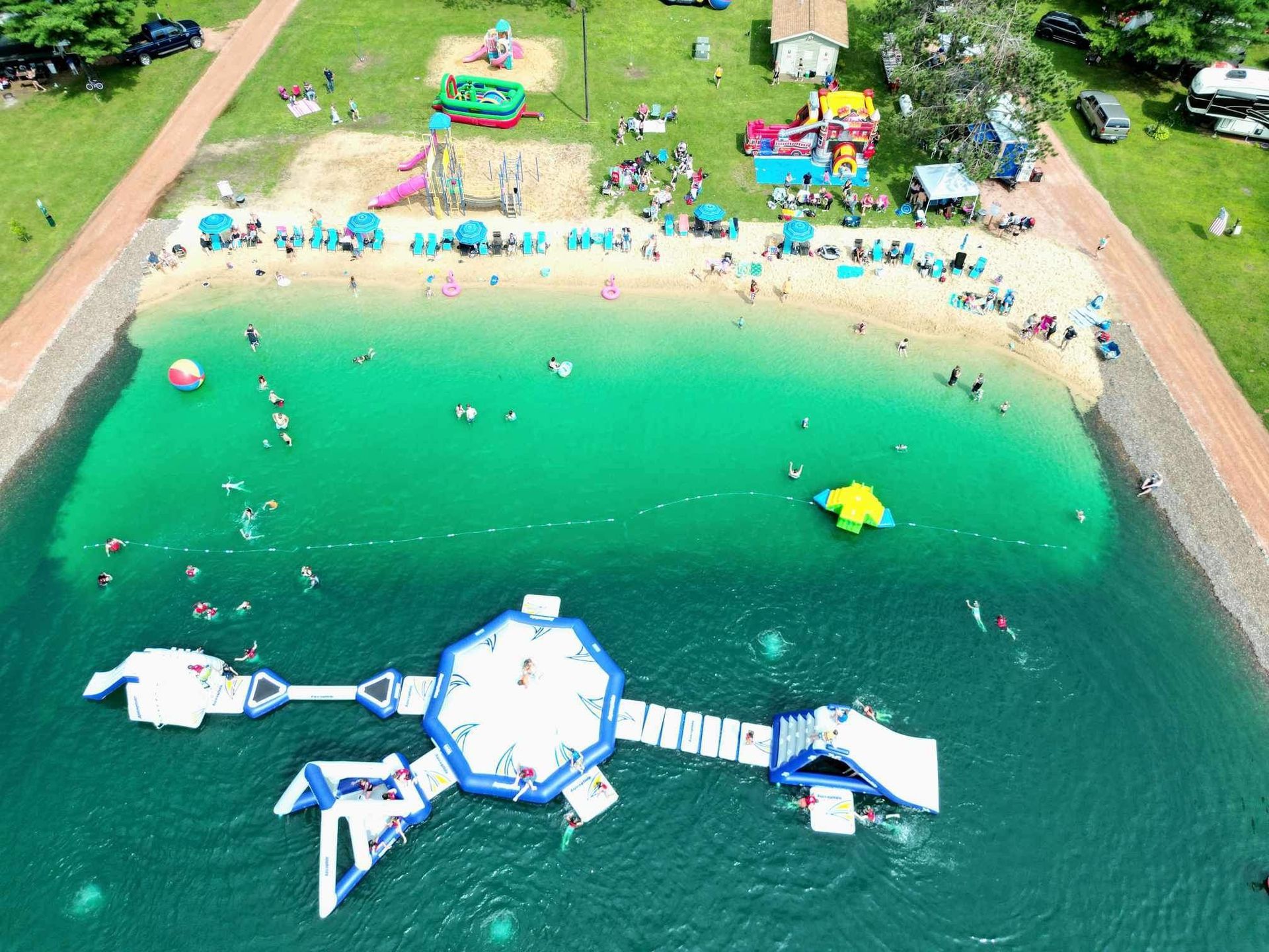 An aerial view of a beach and water park