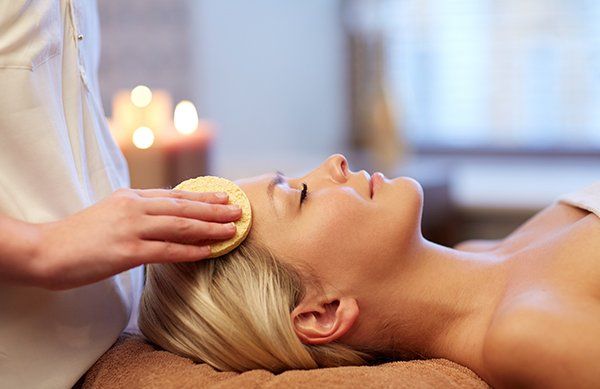 Skin Treatment — Cleaning The Face With Sponge in Franklin, TN