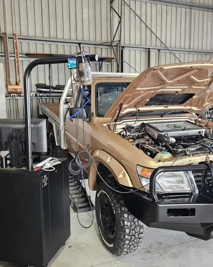 Mechanic Working on Car's Brake System, Using Tools — Track N Back 4x4 In Cooktown, QLD