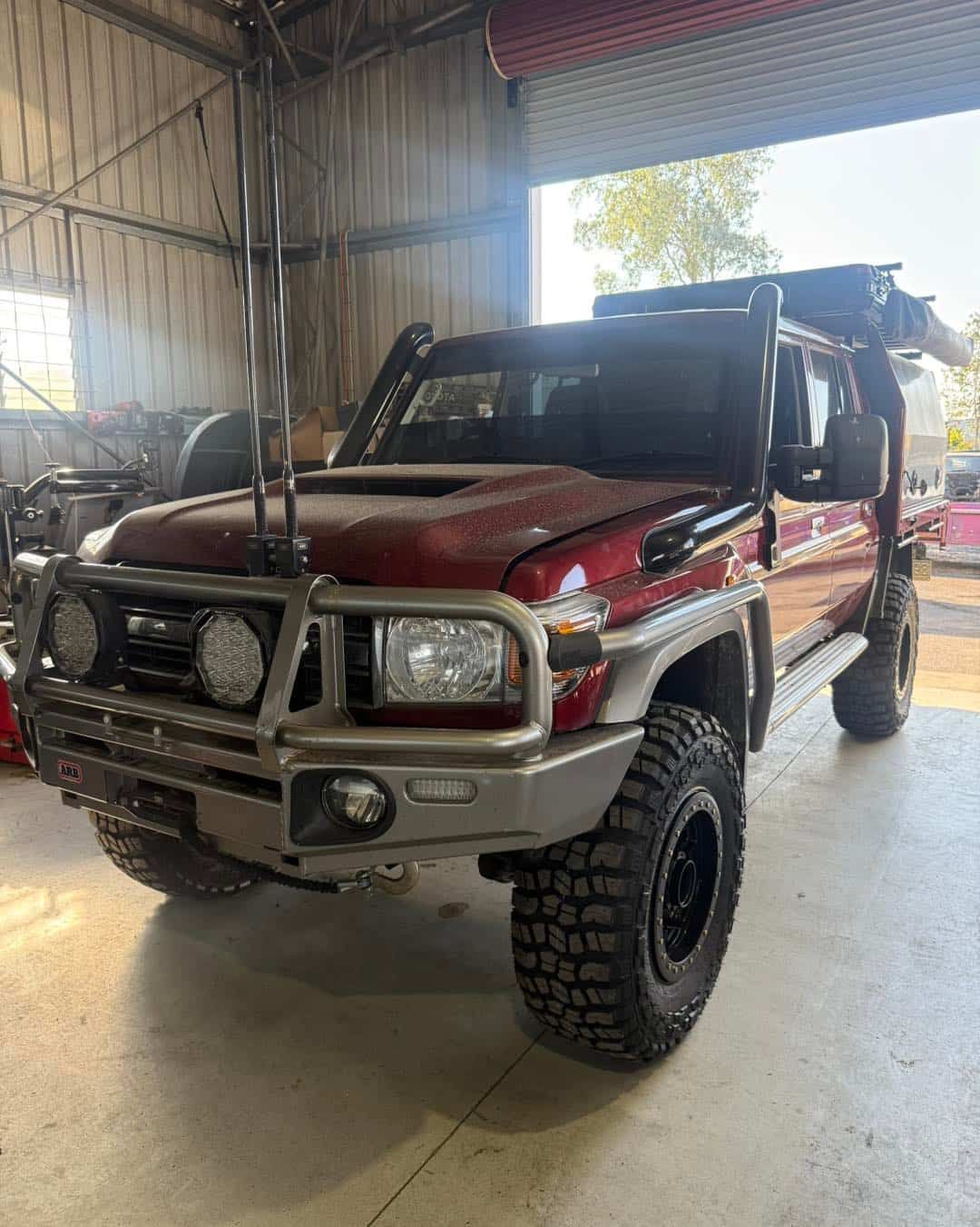 Red Off-road Truck in a Garage With a Front Bumper — Track N Back 4x4 In Weipa, QLD