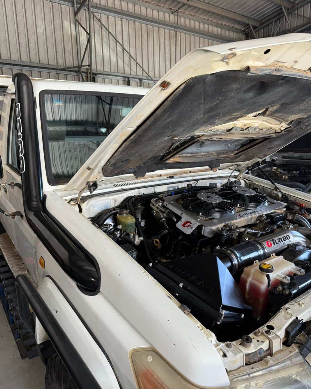 White Off-road Vehicle With the Hood Open, Revealing the Engine — Track N Back 4x4 In Cooktown, QLD