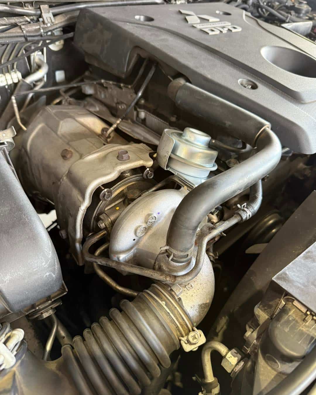 Engine Compartment With a Turbocharger and Hoses, Possibly of a Vehicle — Track N Back 4x4 In Thursday Island, QLD