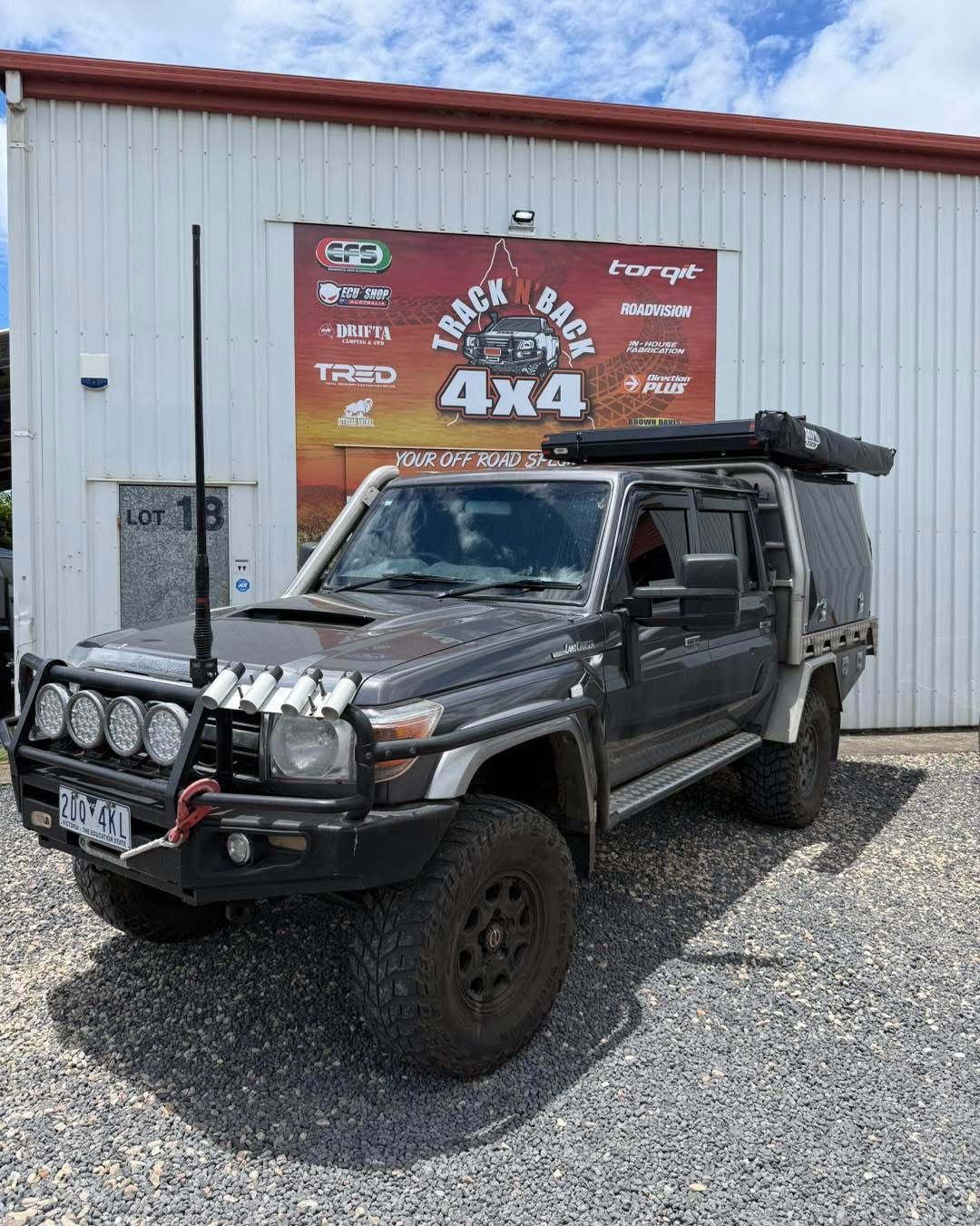 Close-up of a Car's Brake System With Fluid Reservoir, Brake Lines, and the Abs Module — Track N Back 4x4 In Cooktown, QLD